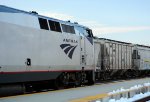 Amtrak 10 and a MMID covered hopper